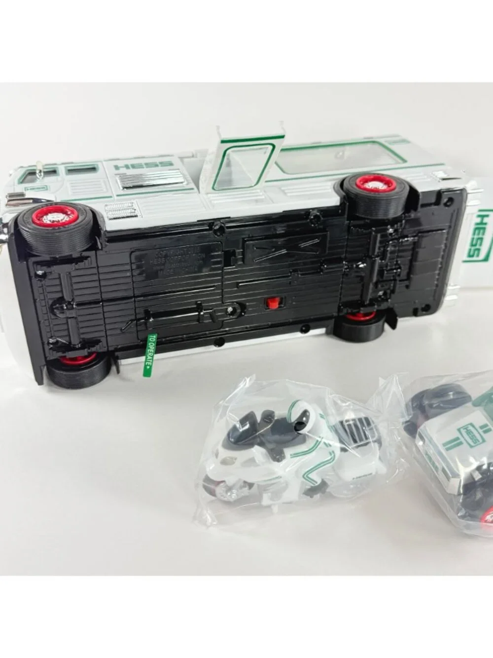 Hess 2018 Toy Truck RV With ATV & Motorbike White/Green